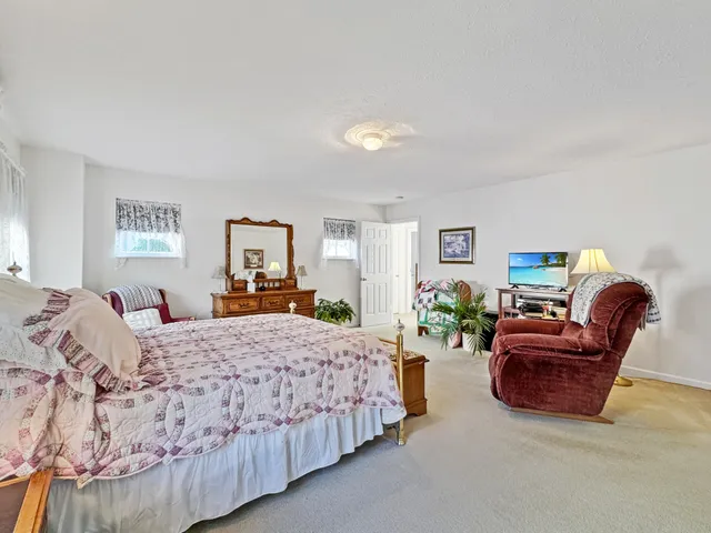 a bathroom with a sink a mirror and a bathtub