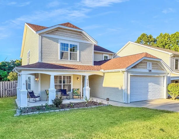 front view of a house with a yard