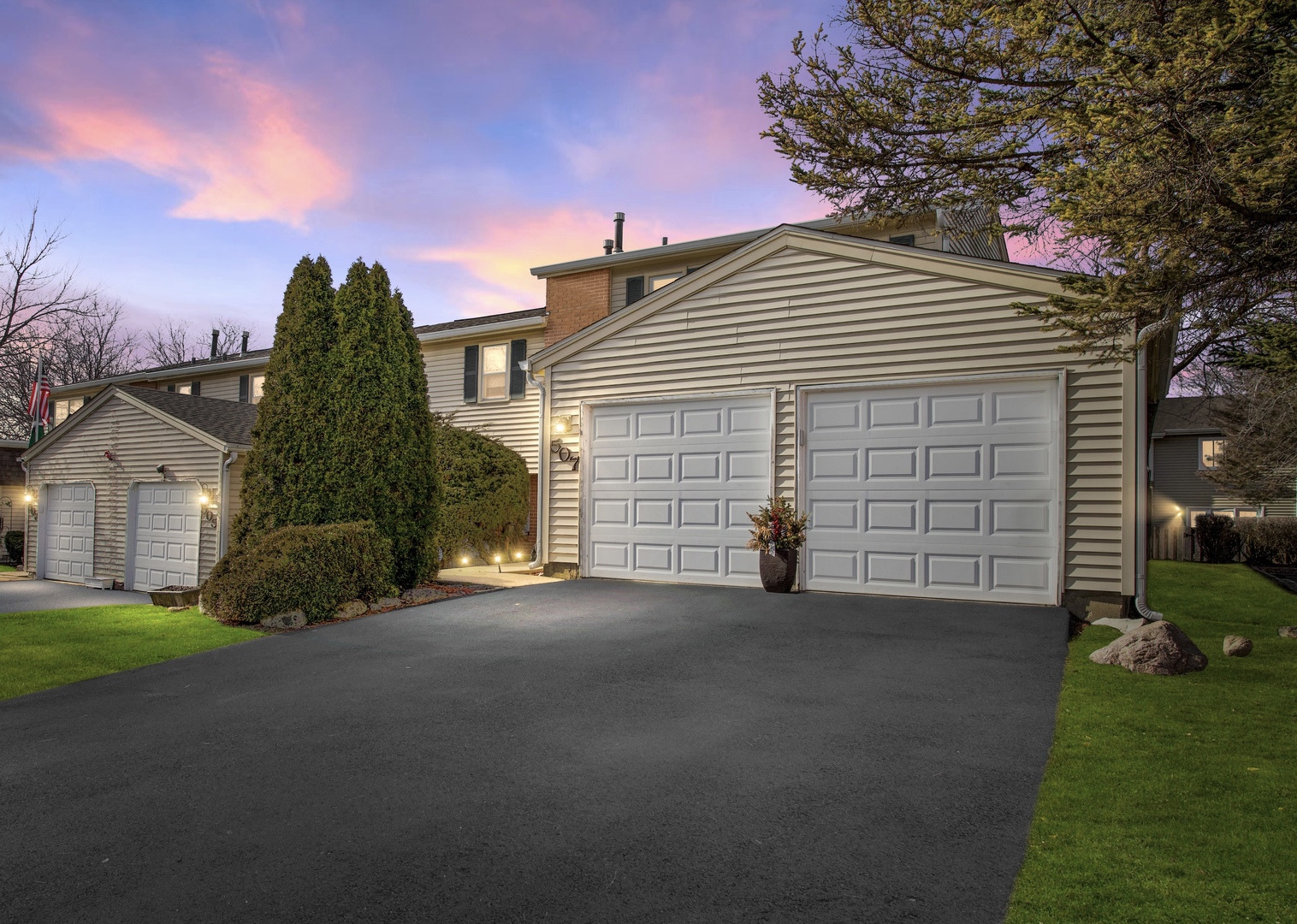 507 Monroe Road Bolingbrook, IL 60440 - Photo 1 of 29 a front view of a house with a yard and garage