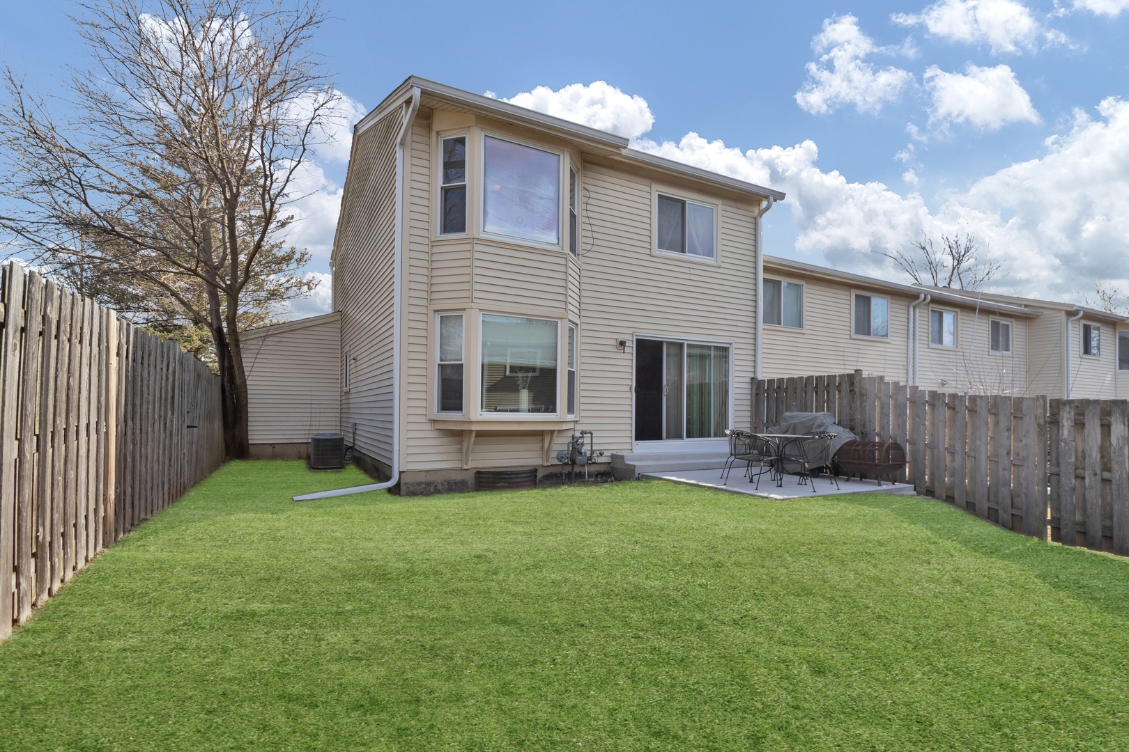 507 Monroe Road Bolingbrook, IL 60440 - Photo 26 of 29 a view of a house with a yard and sitting area