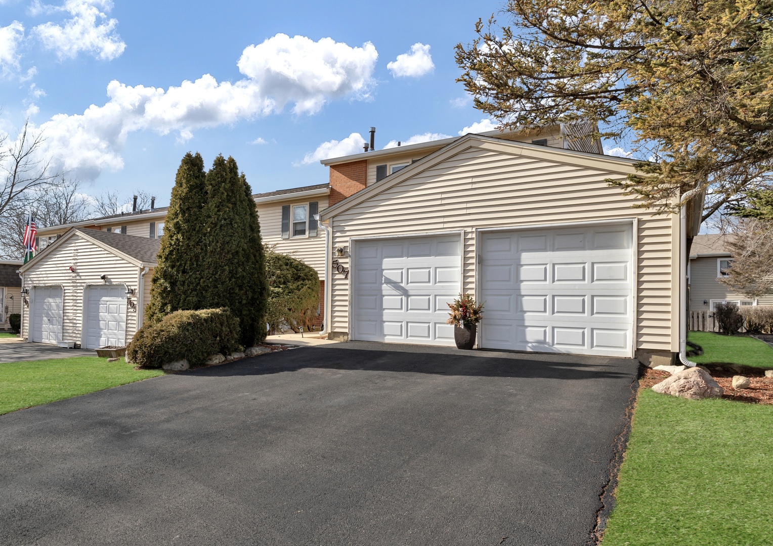 507 Monroe Road Bolingbrook, IL 60440 - Photo 29 of 29 a front view of a house with a yard and garage