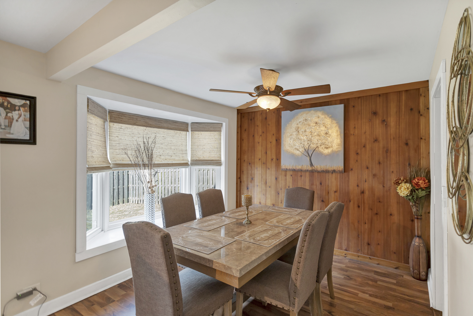 507 Monroe Road Bolingbrook, IL 60440 - Photo 6 of 29 a view of a dining room with furniture large window and wooden floor
