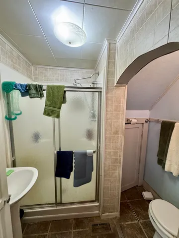 a bathroom with a sink and mirror