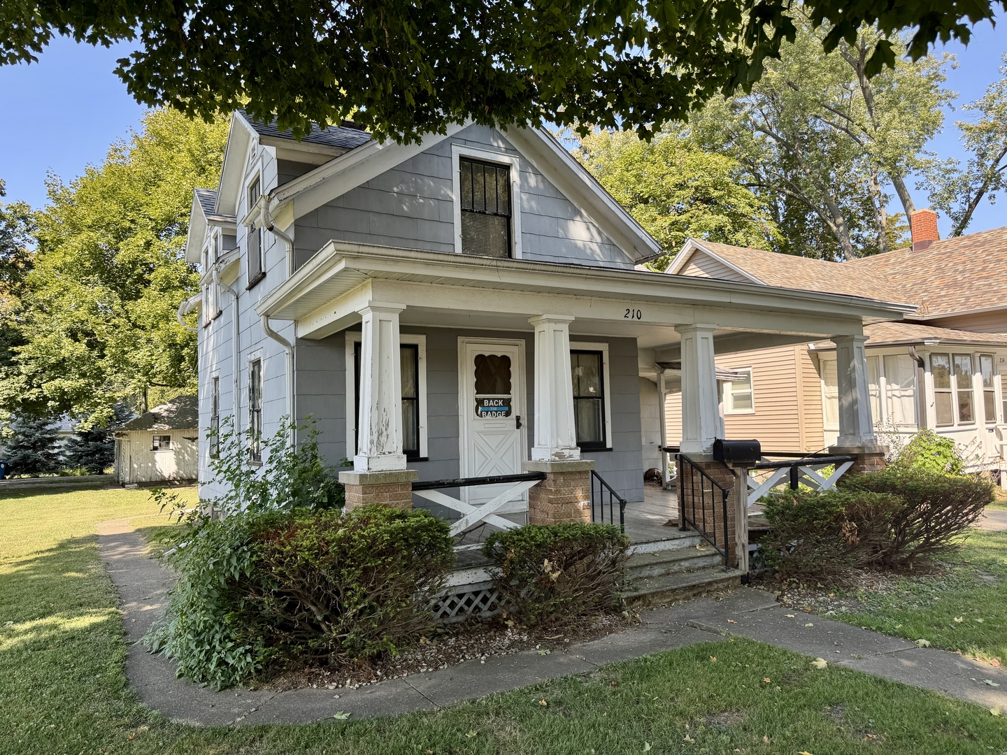 210 North Church Street Princeton, IL 61356 - Photo 20 of 20 a front view of a house with garden