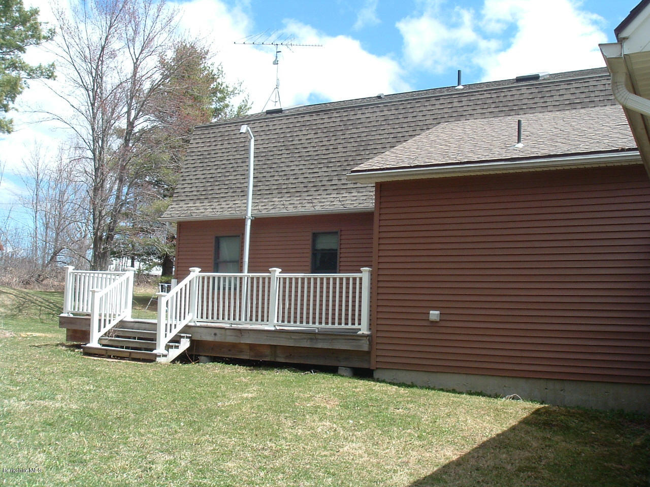 102 East Main Road Peru, MA 01235 - Photo 15 of 21 a view of backyard with wooden fence