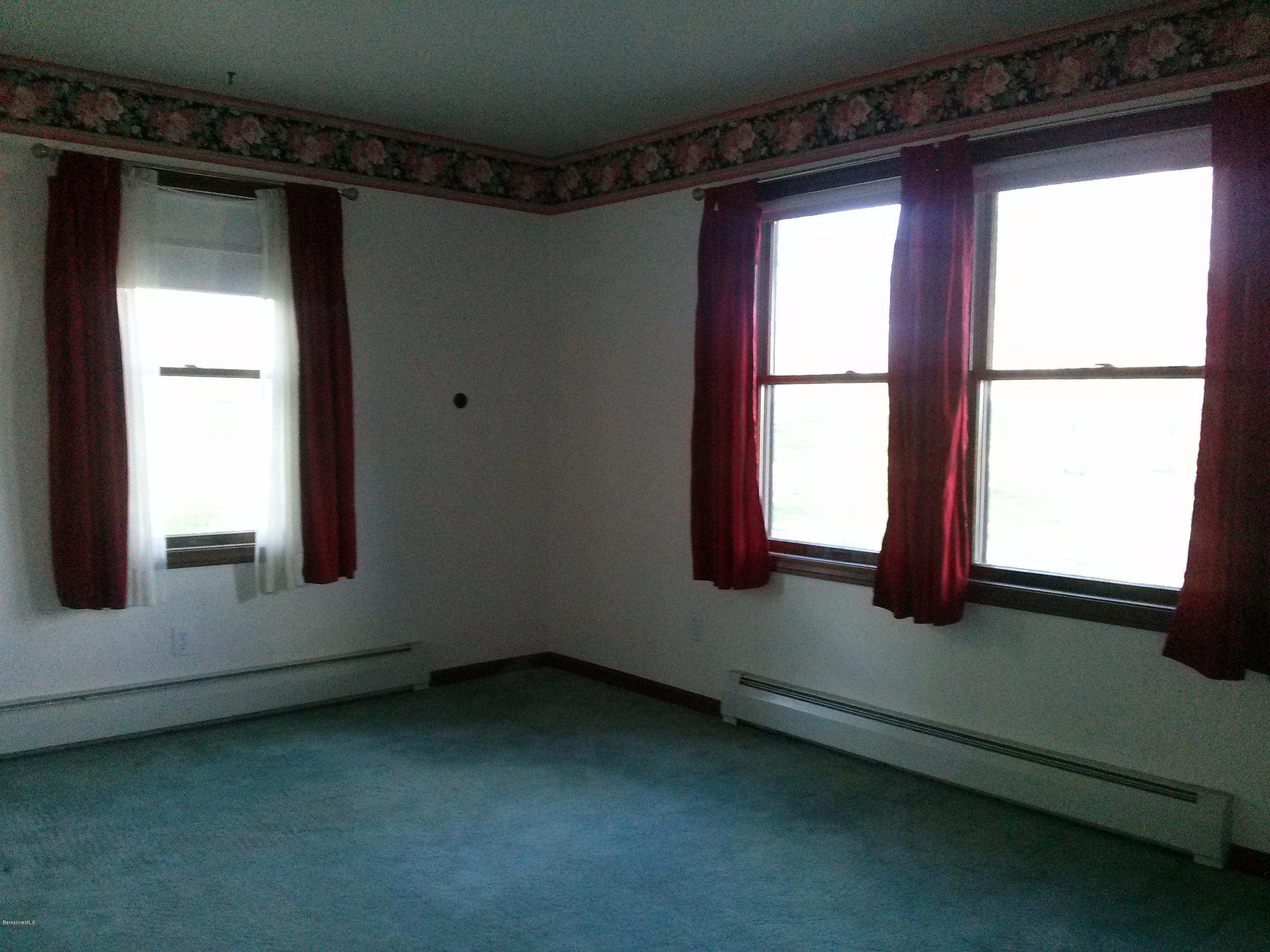 102 East Main Road Peru, MA 01235 - Photo 6 of 21 a view of an empty room with a window