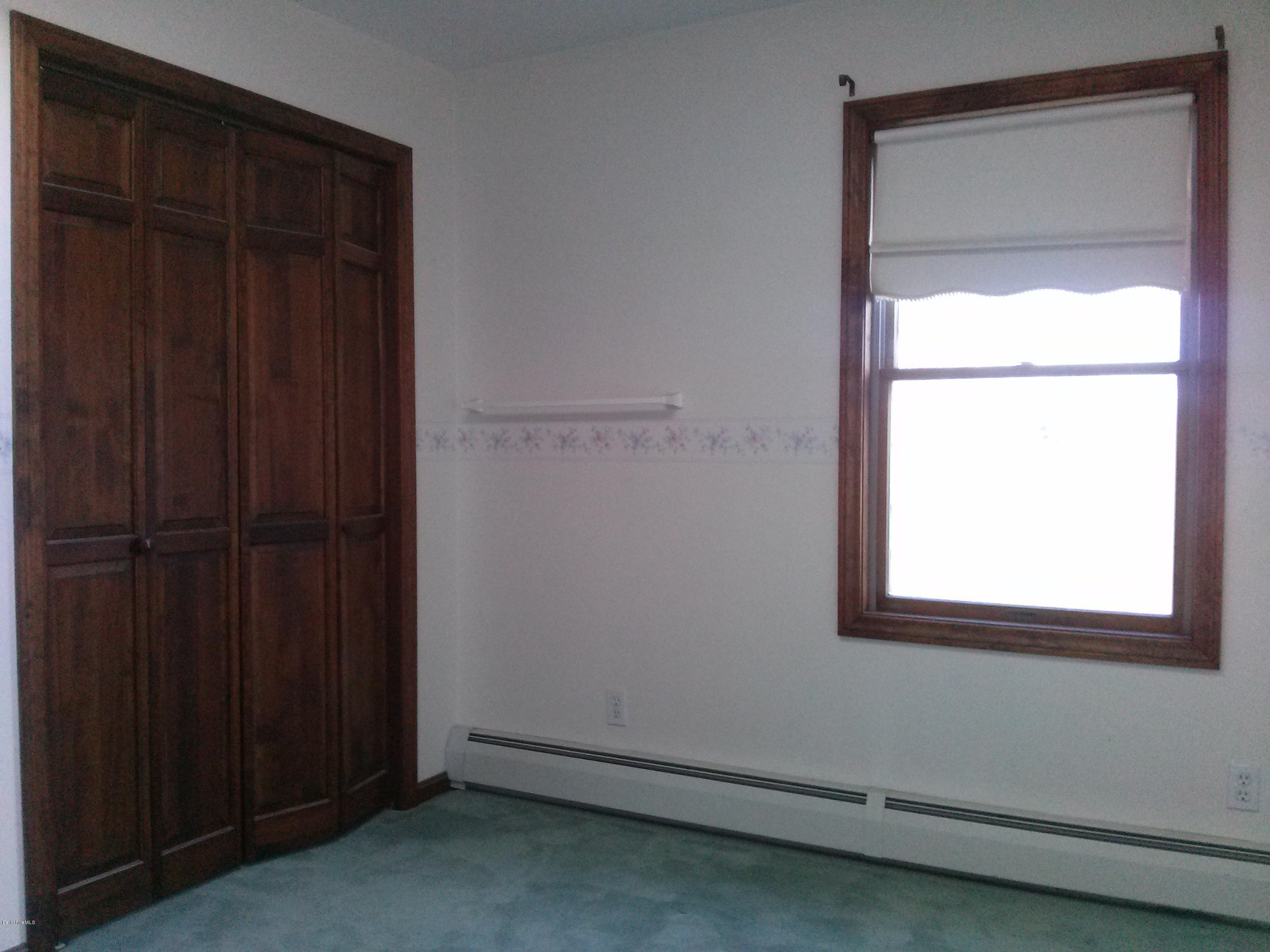 102 East Main Road Peru, MA 01235 - Photo 9 of 21 an empty room with a window