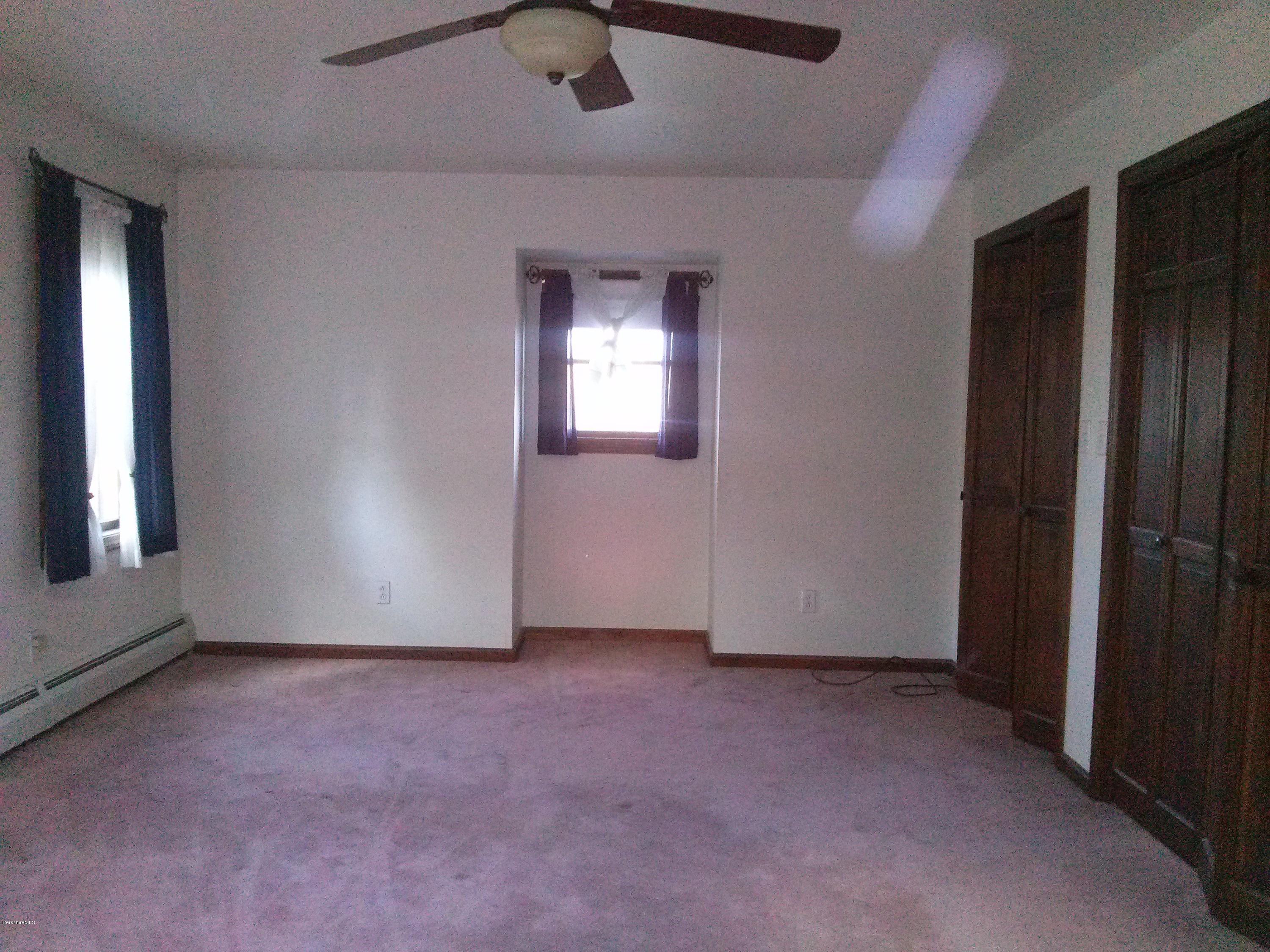102 East Main Road Peru, MA 01235 - Photo 10 of 21 an empty room with windows