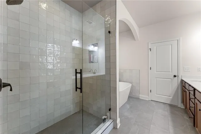 a room with furniture and flat screen tv