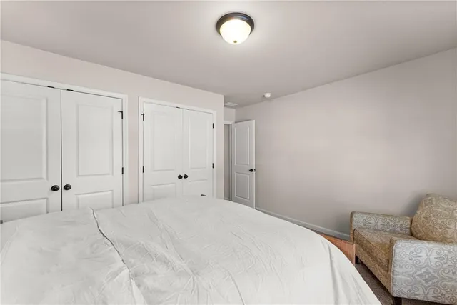 a view of a patio with a table and chairs