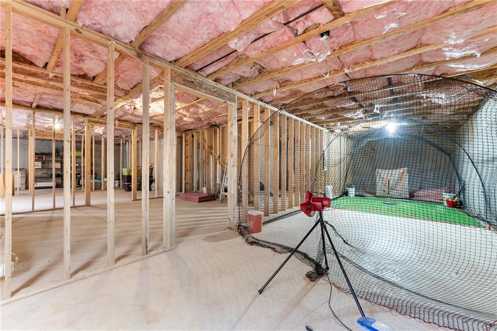 8055 Veranda Curve Ball Ground, GA 30107 - Photo 48 of 65 a view of a patio with a table and chairs