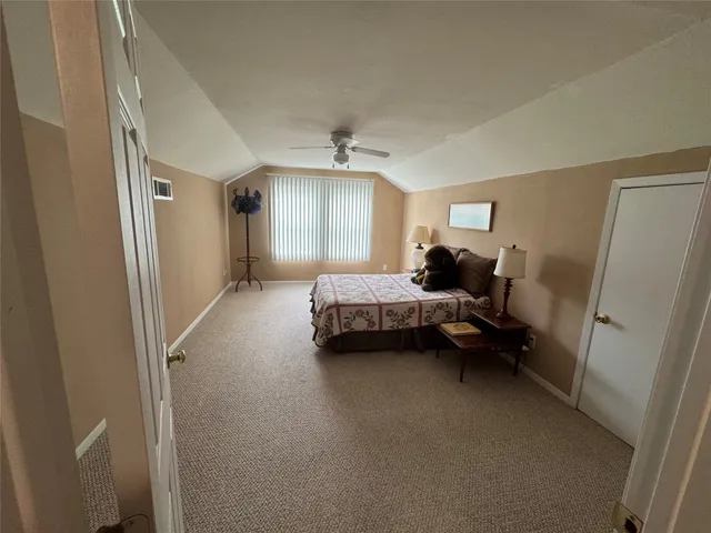 a view of garage with car parked