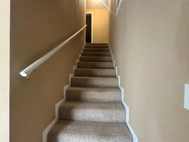 a front view of a house with yard