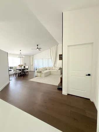 a bedroom with a bed and a table