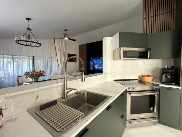 a bedroom with a bed and a cabinets