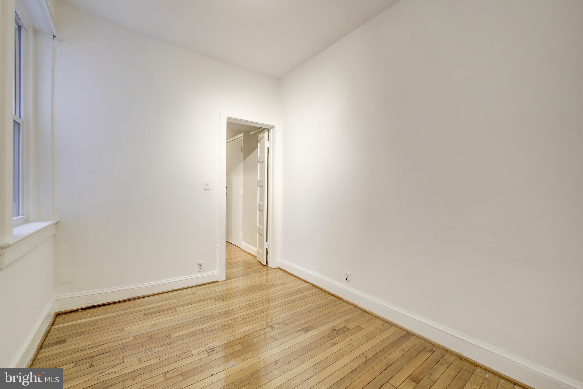 3520 W Place Northwest, Unit 103 Washington, DC 20007 - Photo 10 of 13 a view of an empty room