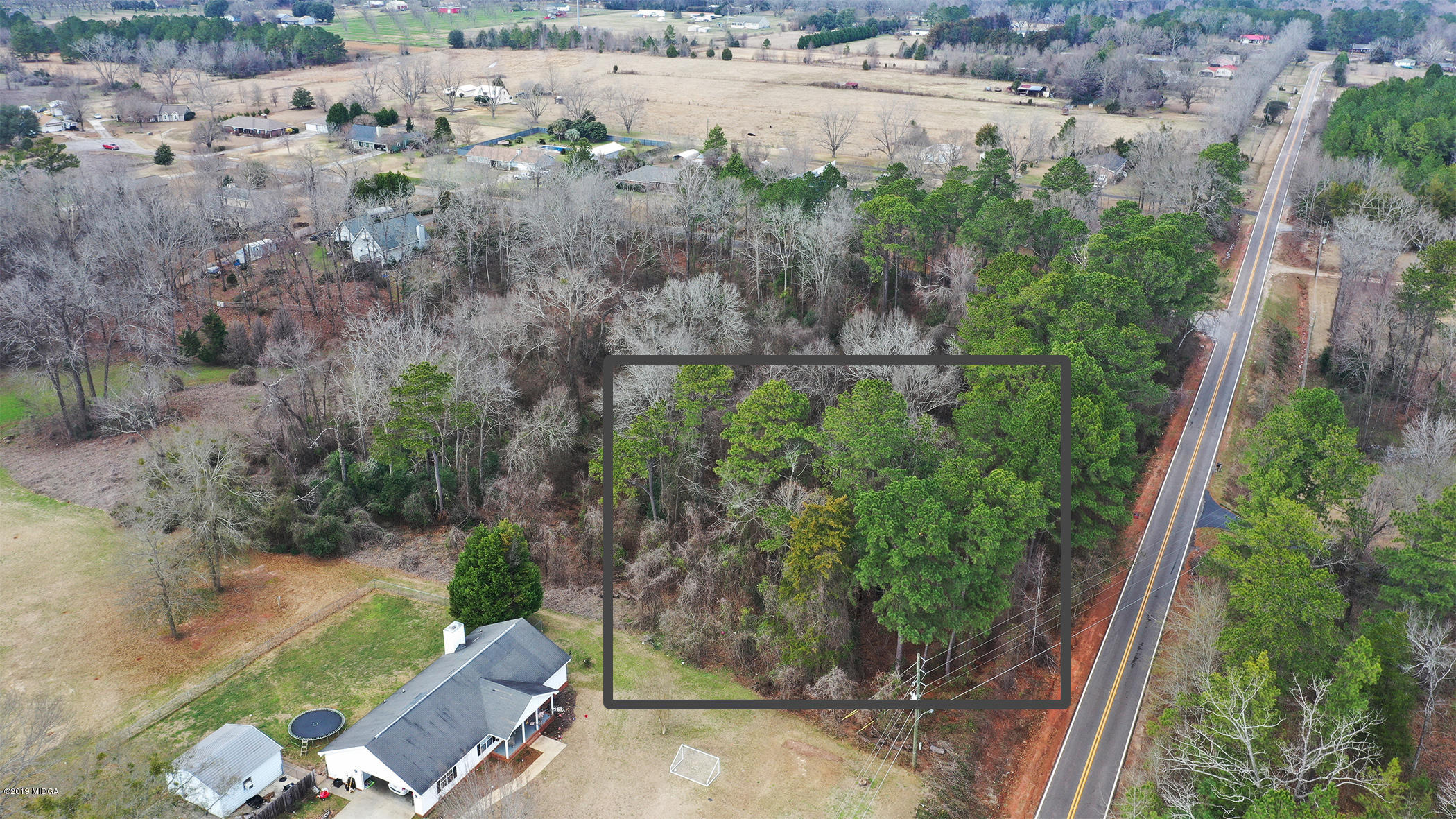 Lot 16 Housers Mill Road Fort Valley, GA 31030 - Photo 19 of 19 an aerial view of a house with a yard