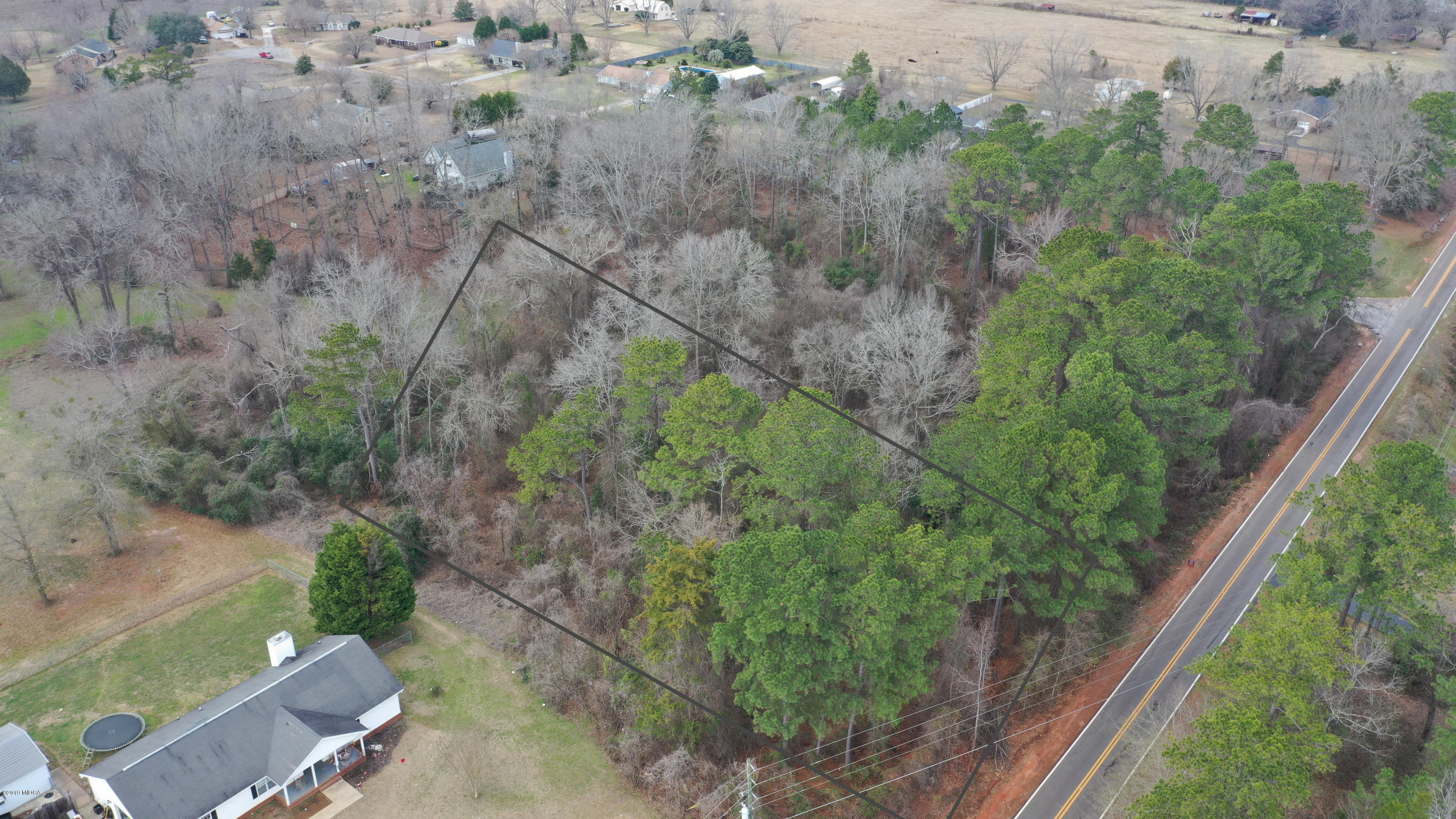 Lot 16 Housers Mill Road Fort Valley, GA 31030 - Photo 7 of 19 an aerial view of a house with yard