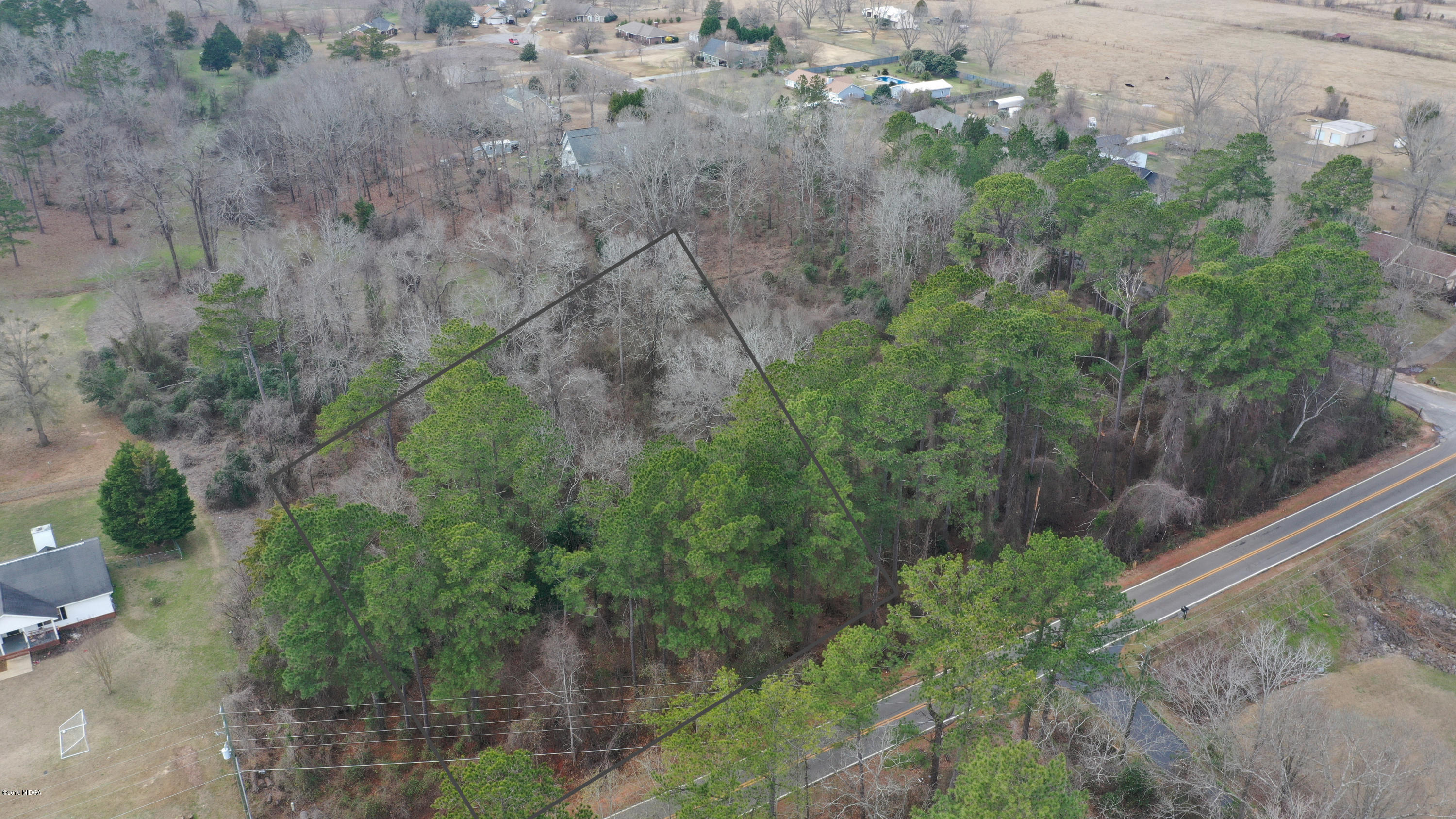 Lot 16 Housers Mill Road Fort Valley, GA 31030 - Photo 8 of 19 a view of a yard with plants and a small pool