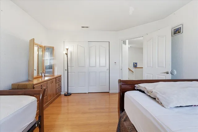 a bed room with a bed and furniture