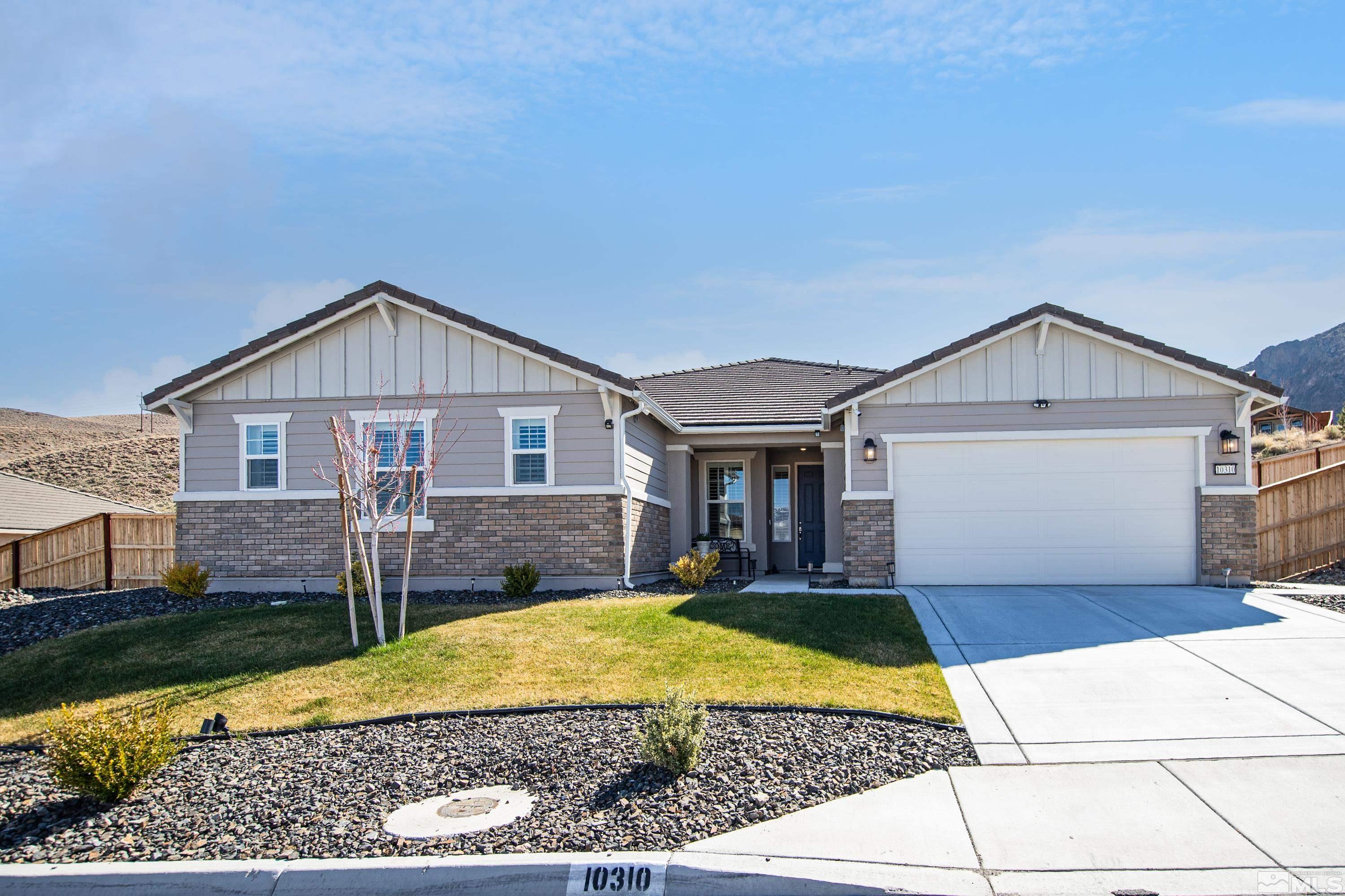 10310 Alchemy Way Reno, NV 89521 - Photo 2 of 30 a view of house with yard and outdoor seating