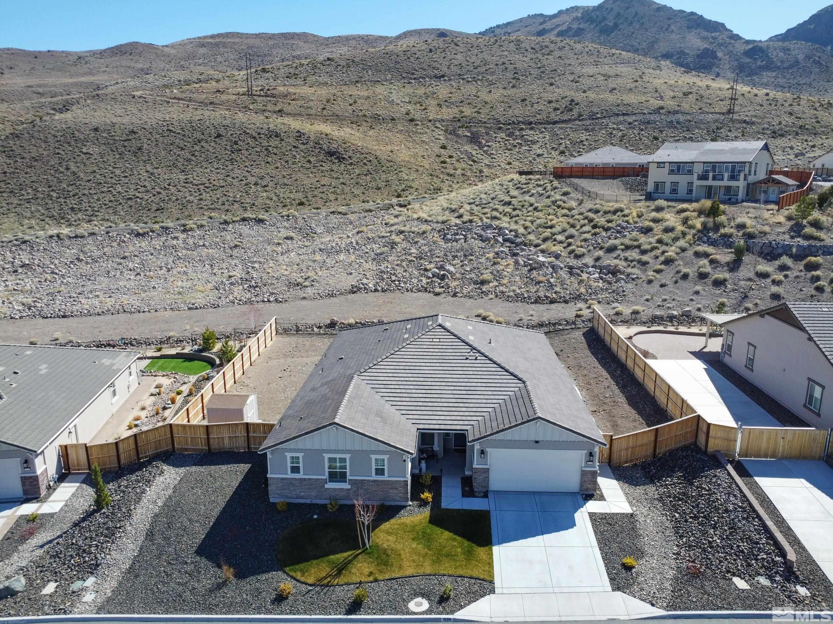 10310 Alchemy Way Reno, NV 89521 - Photo 25 of 30 a aerial view of a house with a yard