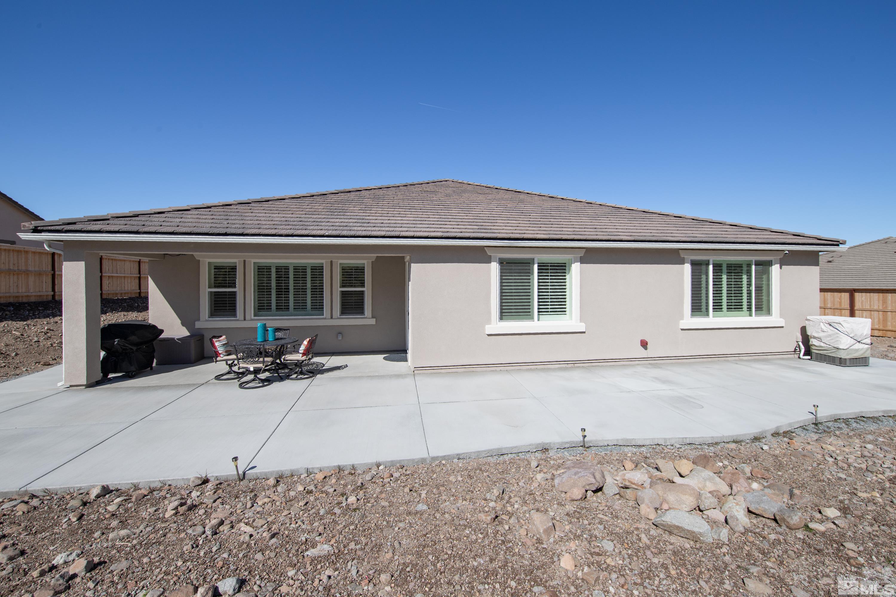 10310 Alchemy Way Reno, NV 89521 - Photo 30 of 30 a house view with a outdoor space
