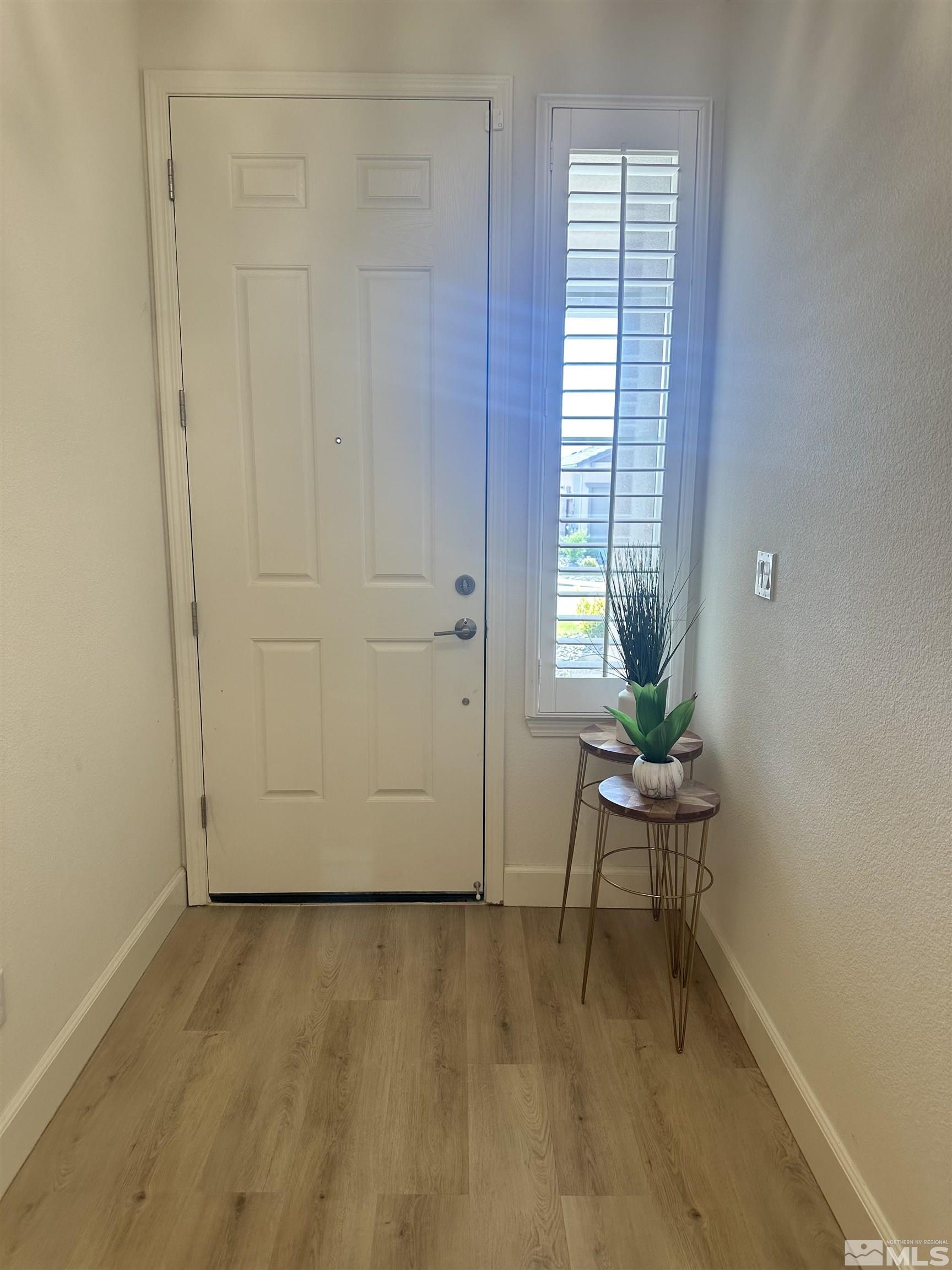 10310 Alchemy Way Reno, NV 89521 - Photo 5 of 30 a view of an empty room and window