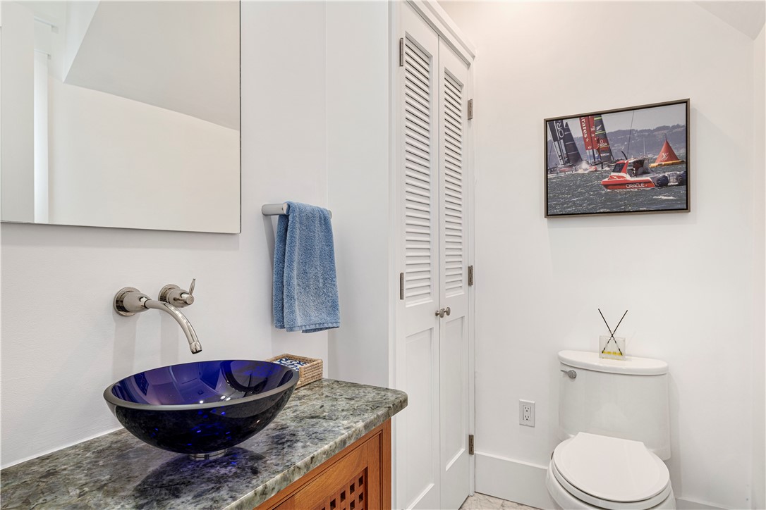 592 Tuckerman Avenue Middletown, RI 02842 - Photo 28 of 50 Powder room and second laundry.