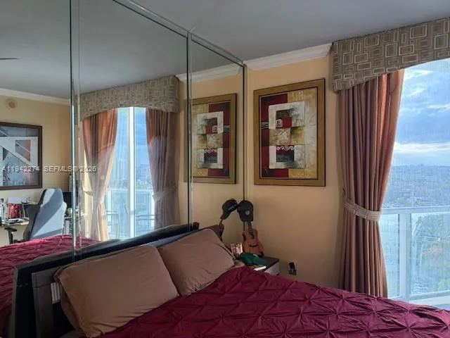 a view of a livingroom with furniture and closet