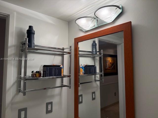 185 Southwest 7th Street, Unit 1502 Miami, FL 33130 - Photo 14 of 15 a view of a livingroom with furniture and closet