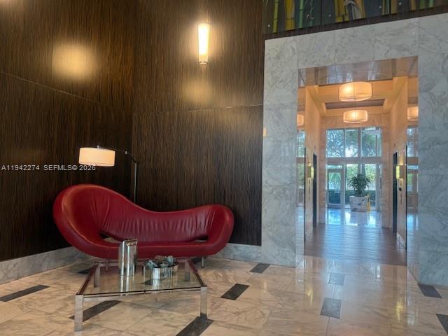 185 Southwest 7th Street, Unit 1502 Miami, FL 33130 - Photo 2 of 6 a view of a room with table and chairs