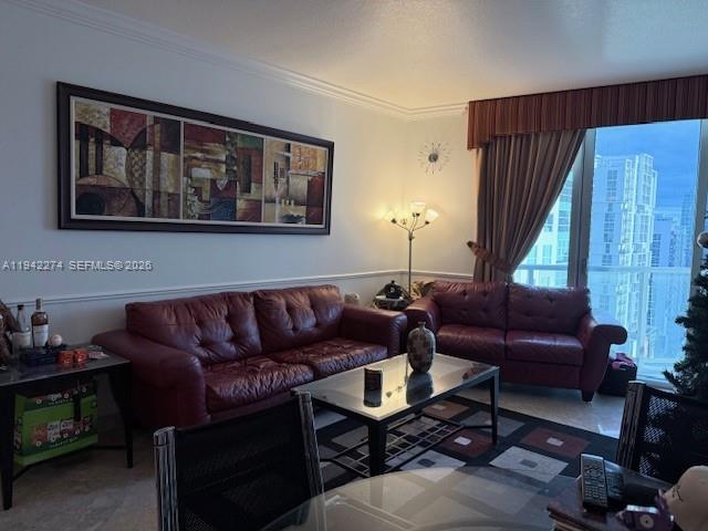 185 Southwest 7th Street, Unit 1502 Miami, FL 33130 - Photo 8 of 15 a living room with furniture and a window