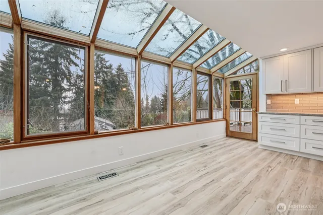 a view of a room with a large window