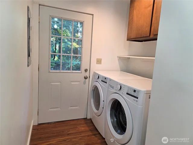 a utility room with dryer and washer