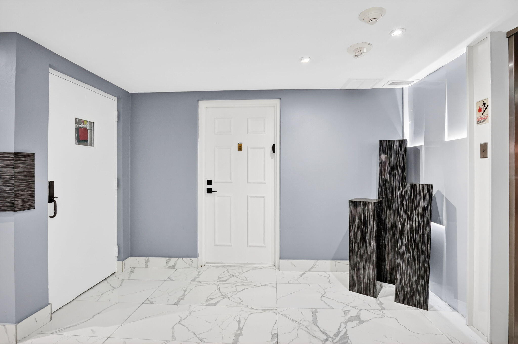 7233 Promenade Drive, Unit 101 Boca Raton, FL 33433 - Photo 58 of 58 Entry from Lobby