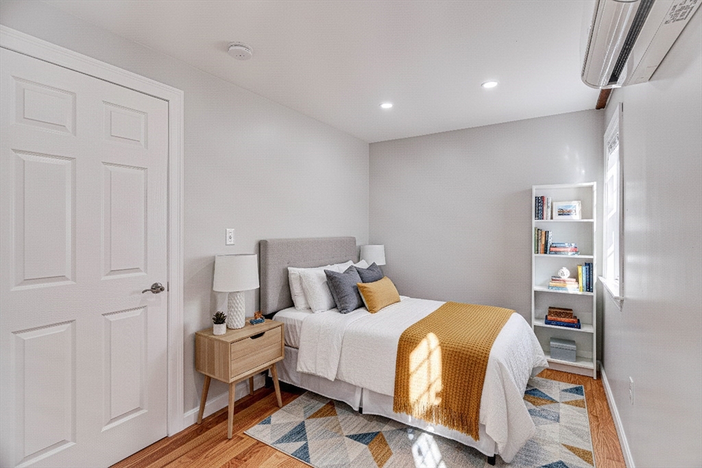 32 Northey Street, Unit 32 Salem, MA 01970 - Photo 17 of 29 a bedroom with a bed and a window