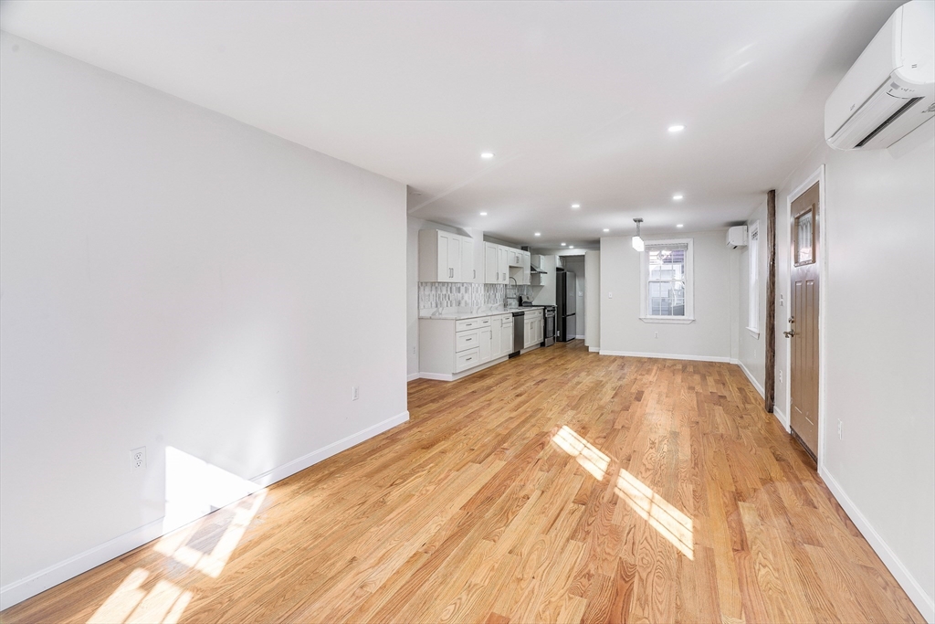 32 Northey Street, Unit 32 Salem, MA 01970 - Photo 10 of 29 a view of empty room with wooden floor