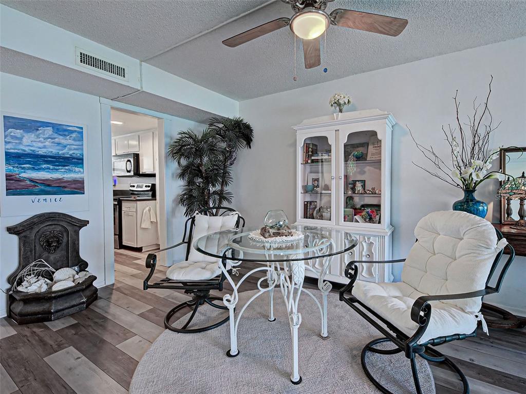 633 Alhambra Road, Unit 1006 Venice, FL 34285 - Photo 9 of 55 a workspace with furniture