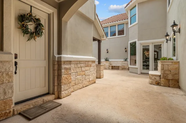 a bed room with a bed and a large window