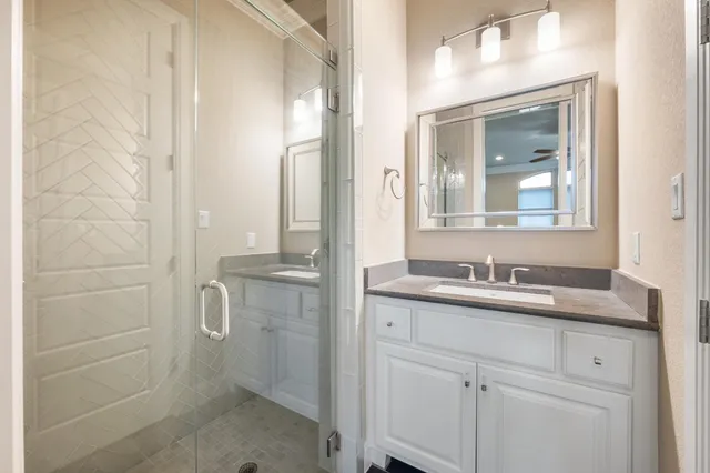 an aerial view of a house with outdoor space and street view