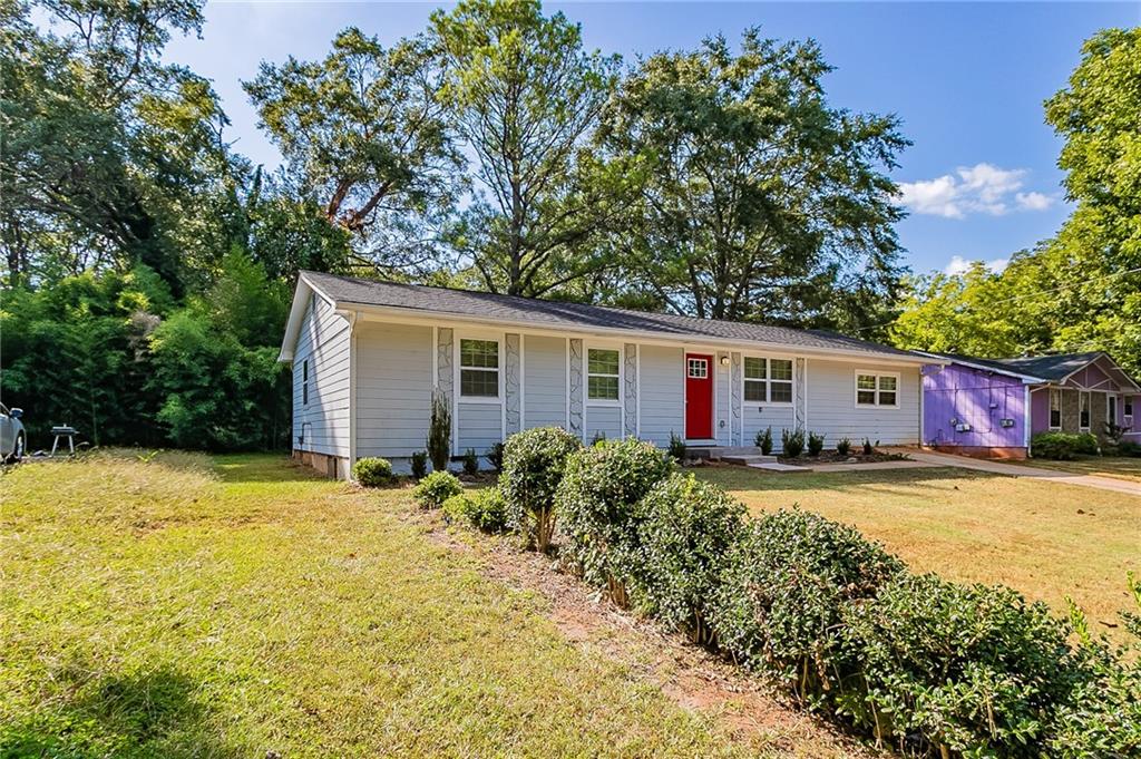 1669 Freedom Valley Decatur, GA 30032 - Photo 2 of 27 a view of a house with back yard