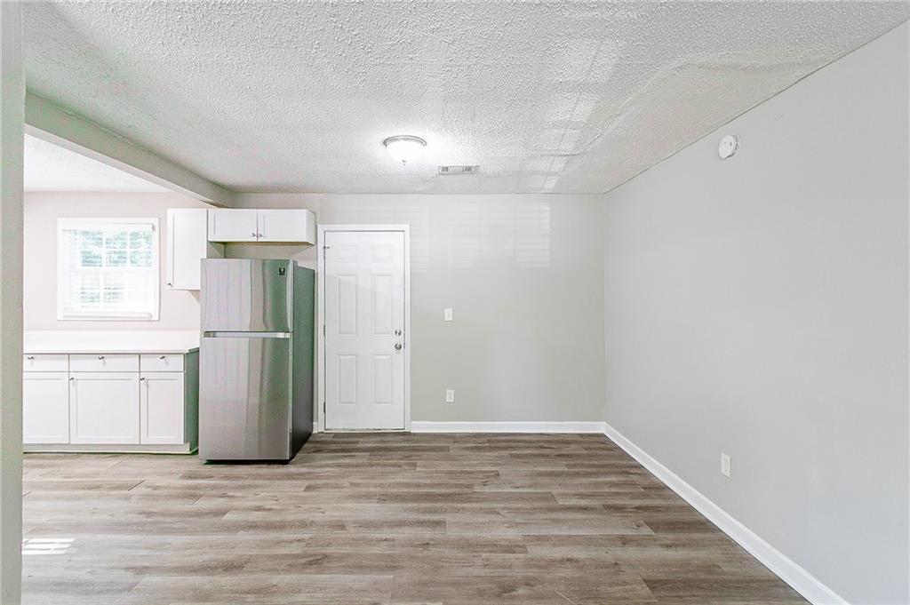 1669 Freedom Valley Decatur, GA 30032 - Photo 8 of 27 a view of an empty room with a window