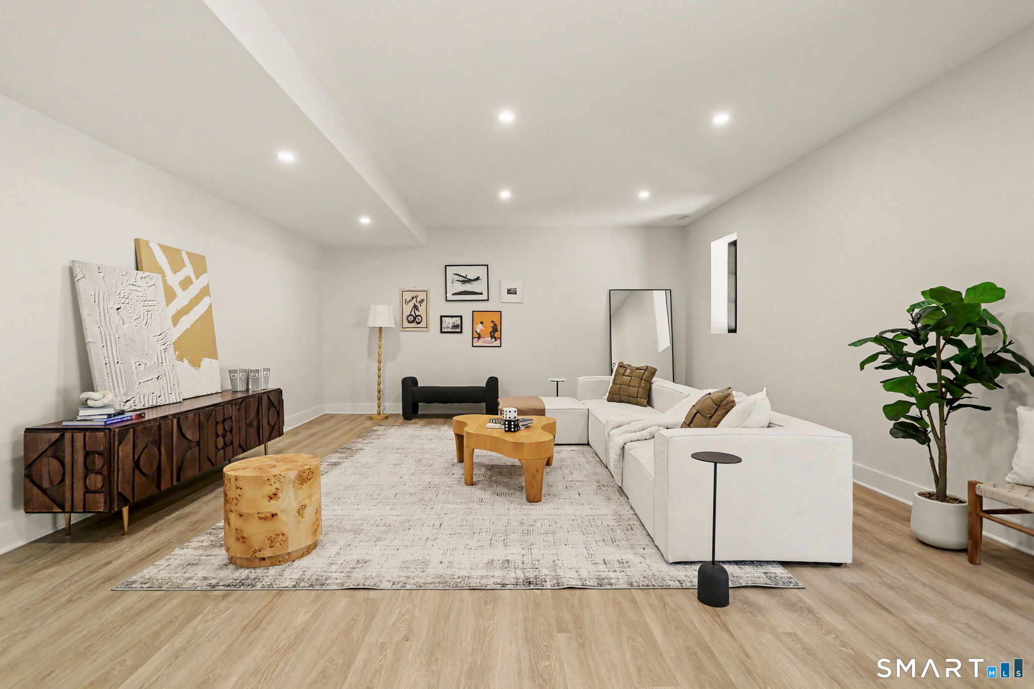 31 Gray Farms Road Stamford, CT 06905 - Photo 32 of 40 a living room with hard wood flooring and furniture