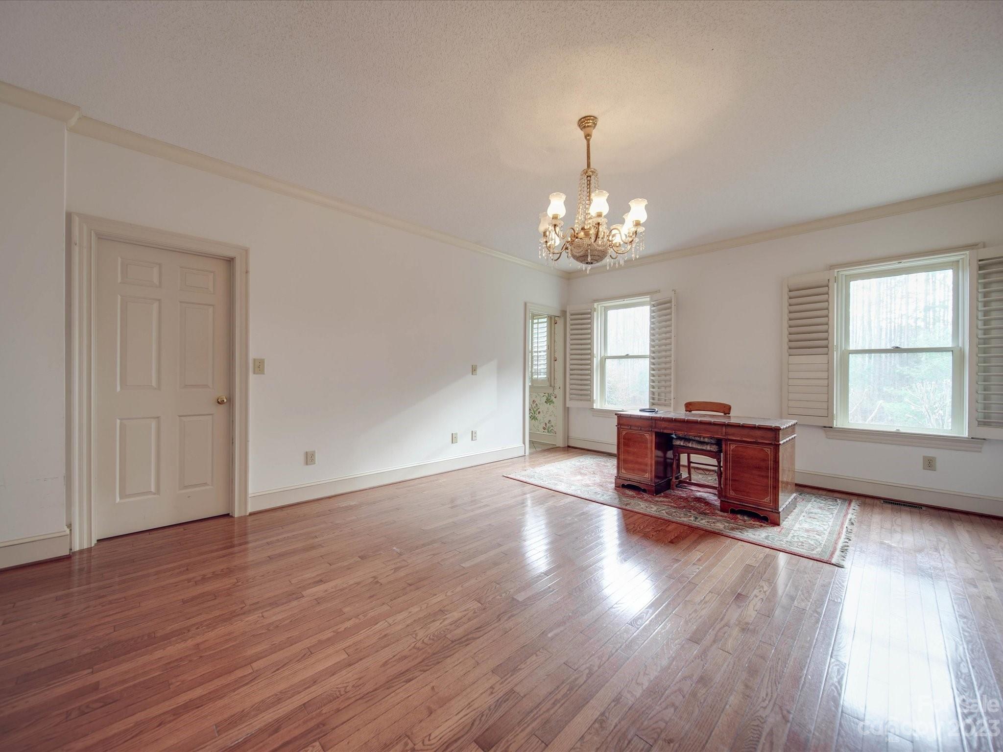 1939 Neel Road Salisbury, NC 28147 - Photo 19 of 48 a view of livingroom with furniture window and wooden floor
