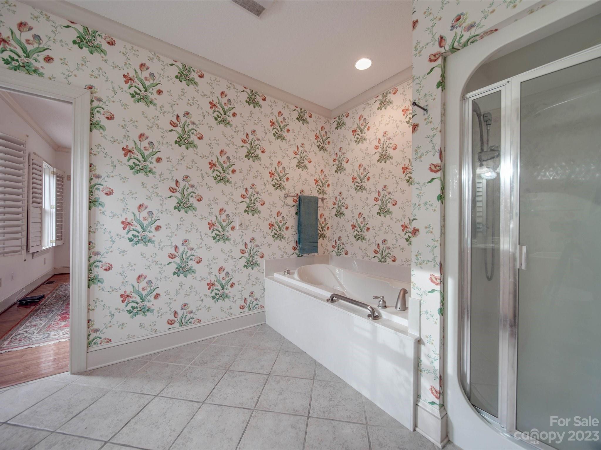 1939 Neel Road Salisbury, NC 28147 - Photo 24 of 48 a bathroom with a bathtub and shower