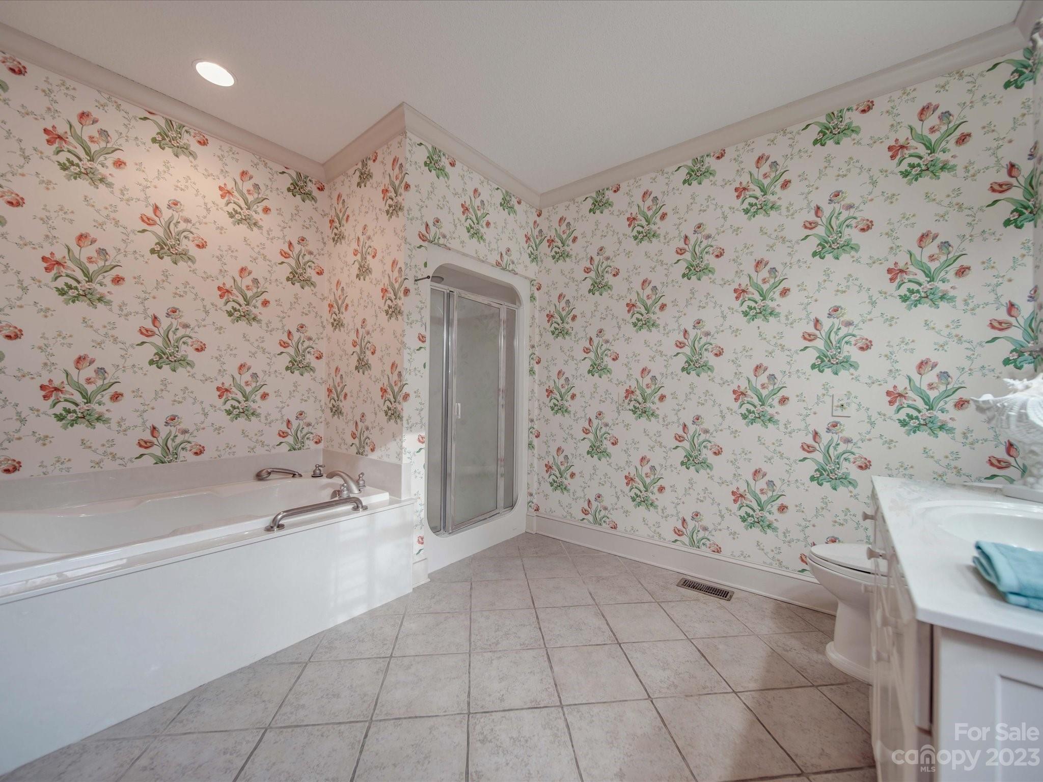 1939 Neel Road Salisbury, NC 28147 - Photo 25 of 48 a bathroom with a bathtub and shower