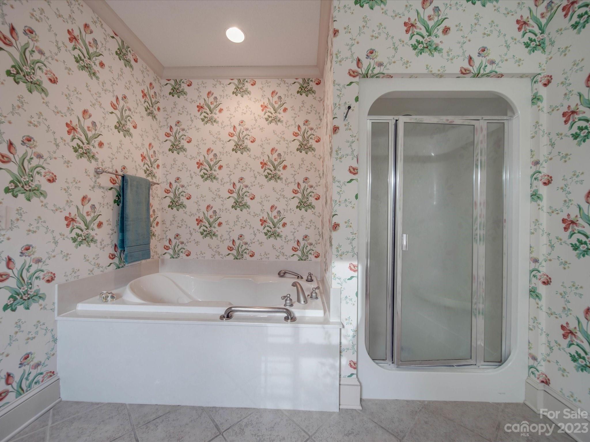 1939 Neel Road Salisbury, NC 28147 - Photo 26 of 48 a bathroom with a bathtub and shower