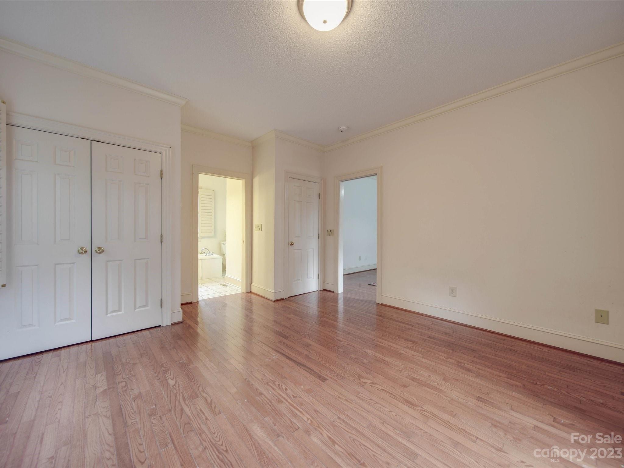 1939 Neel Road Salisbury, NC 28147 - Photo 33 of 48 a view of an empty room with wooden floor and window