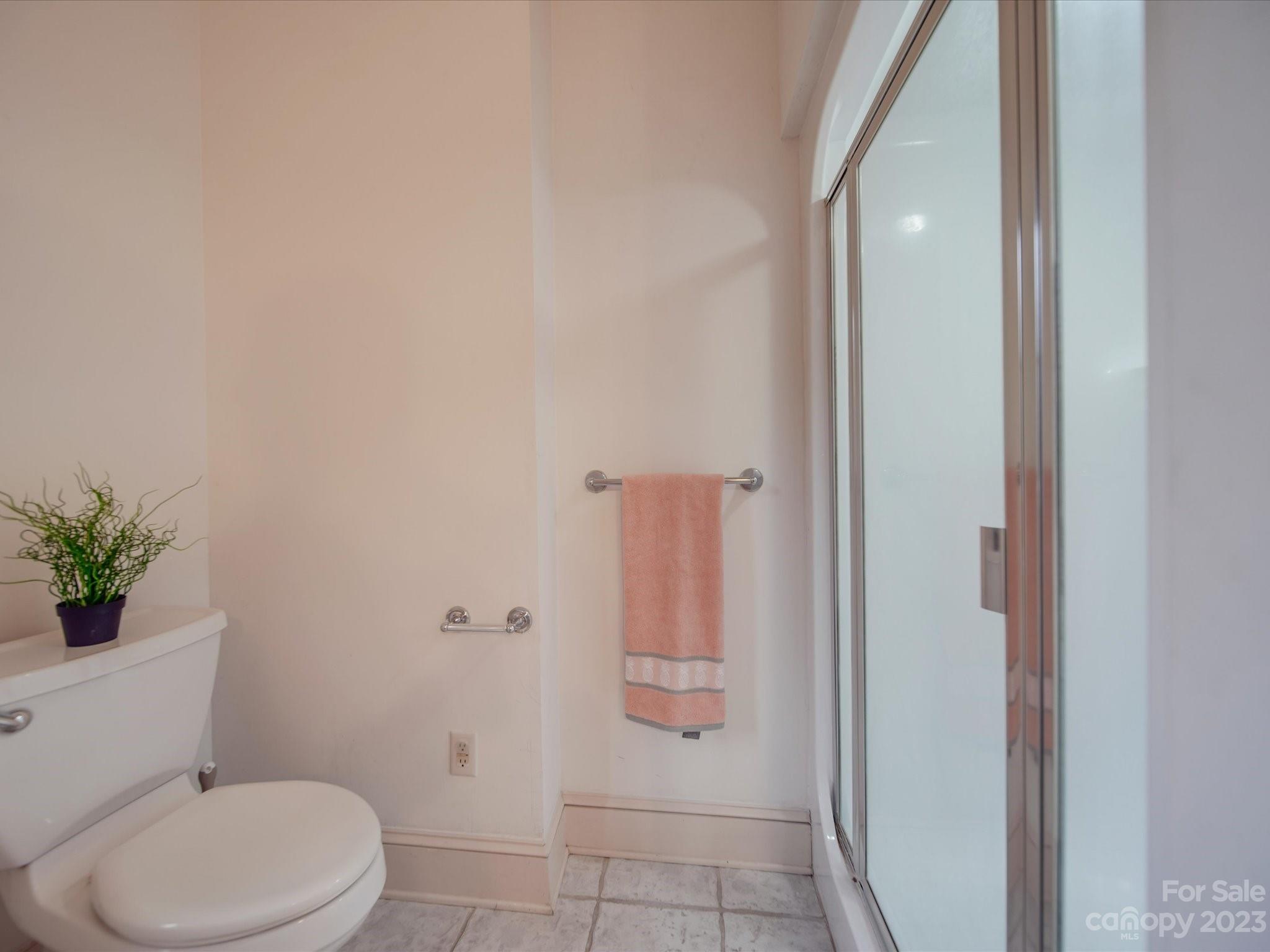 1939 Neel Road Salisbury, NC 28147 - Photo 40 of 48 a bathroom with a toilet and a shower